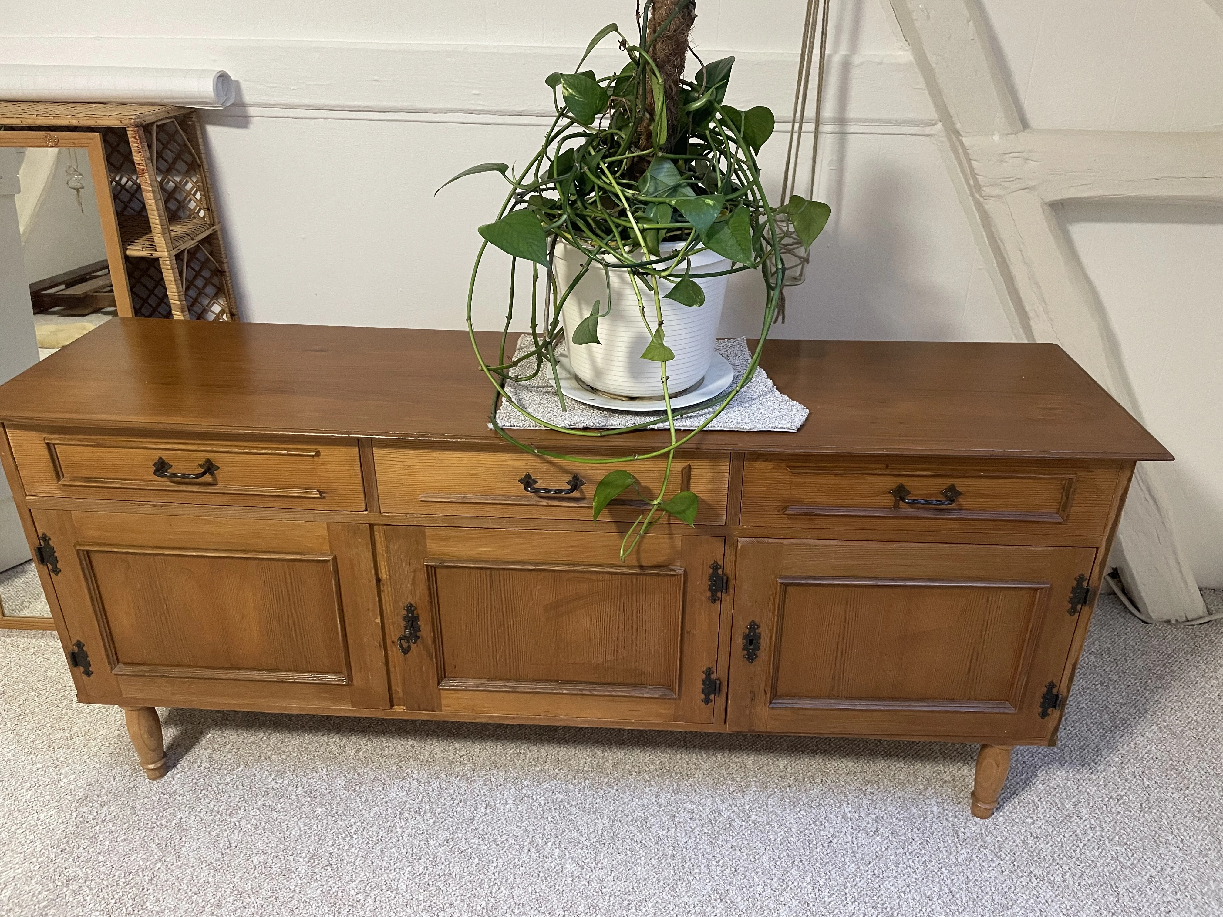 this sideboard is still in the room, and a desk and a shelve