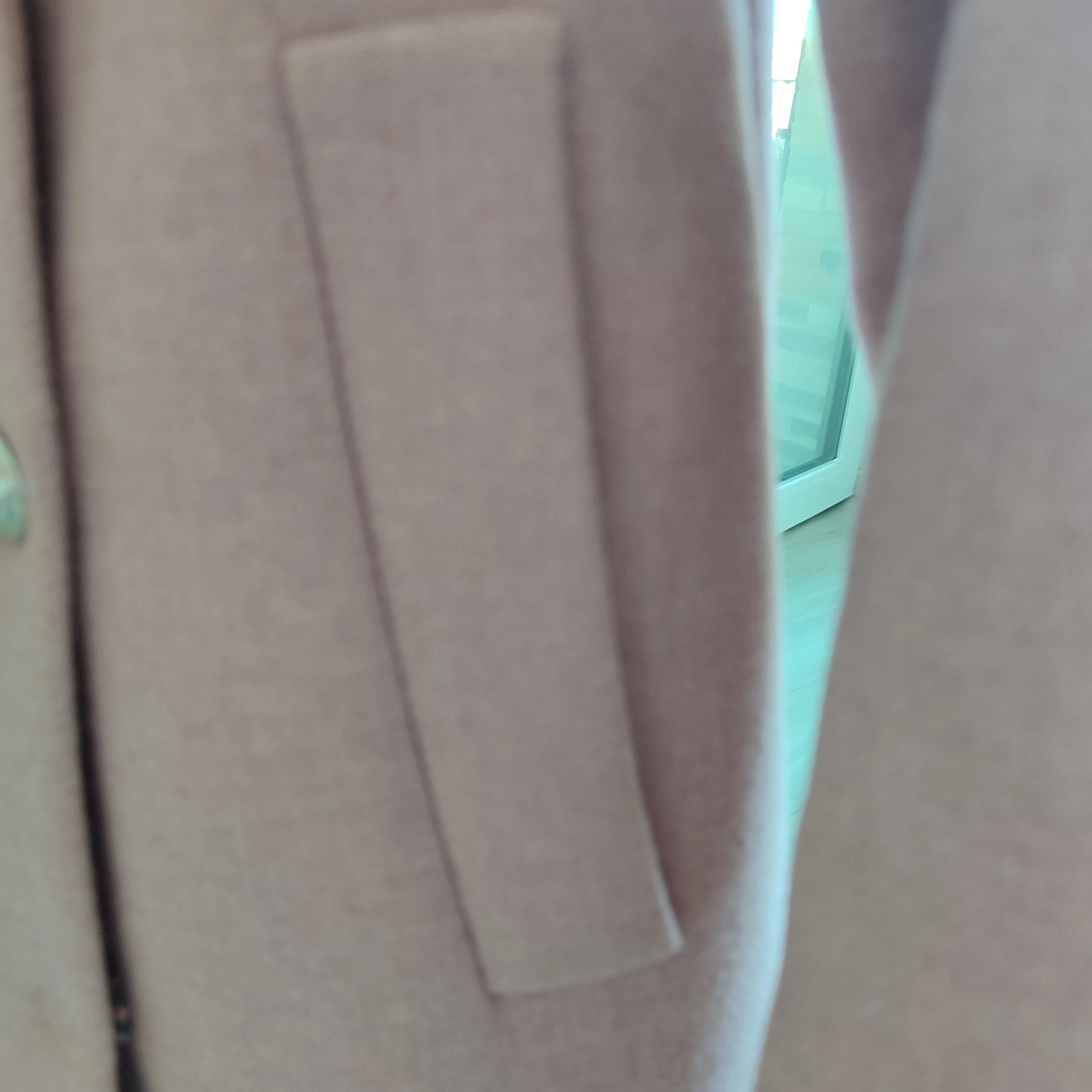Seitliche Taschen