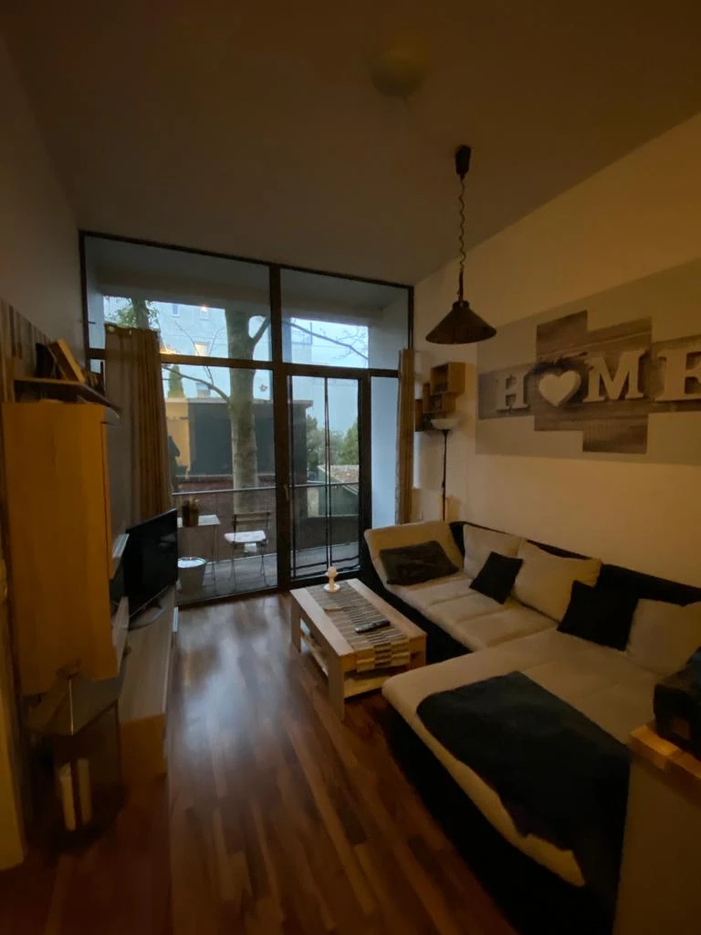 Wohnzimmer mit Küche