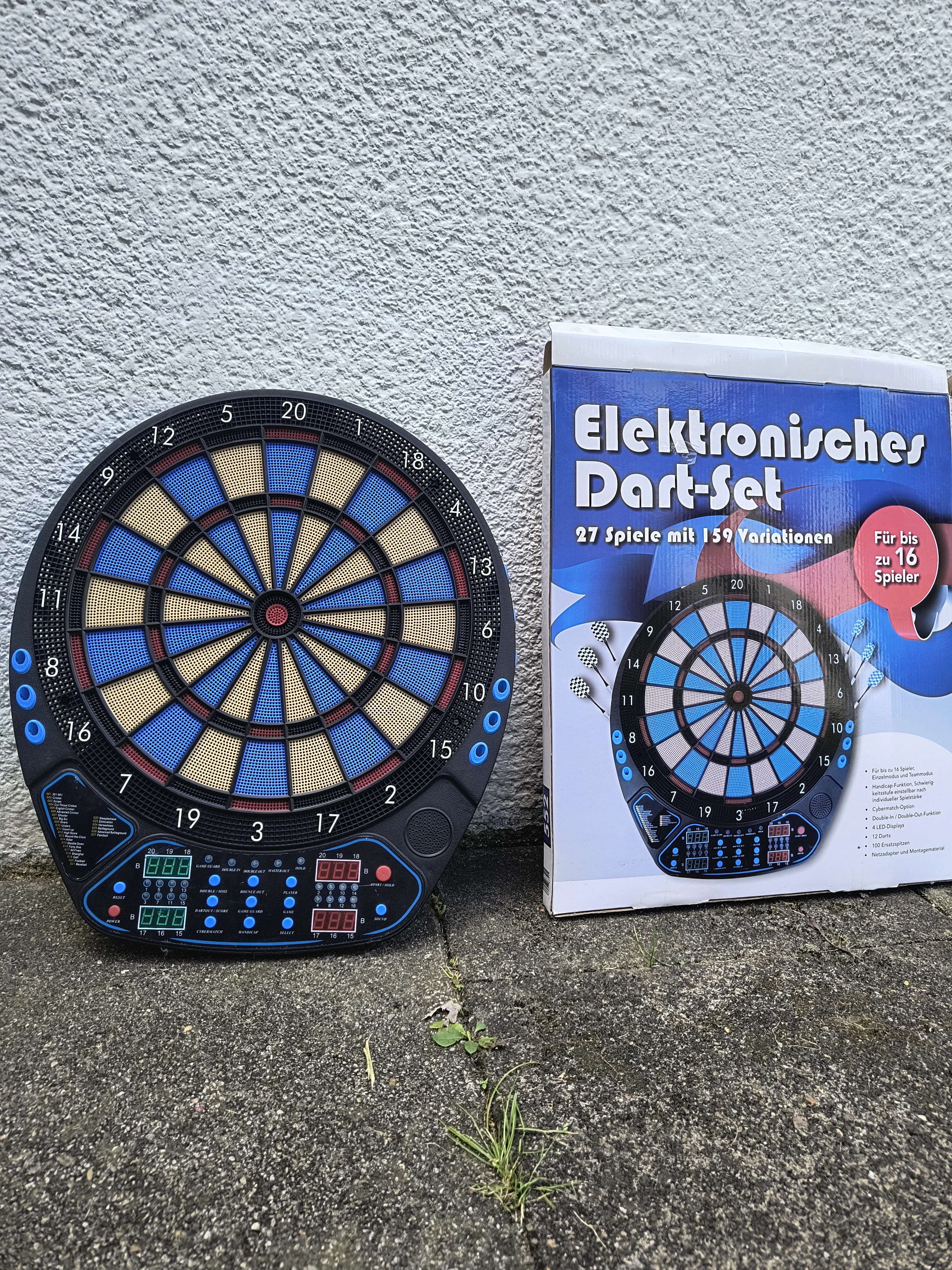 Dart und Originalverpackung 